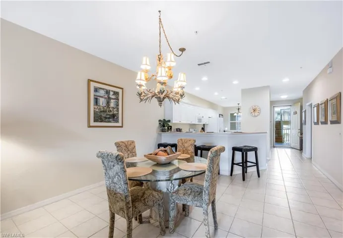 Dining room with recessed lighting, visible vents, baseboards, and light tile patterned floors