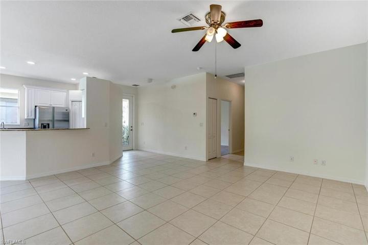 Facing entry and walkway to the garage to the right.