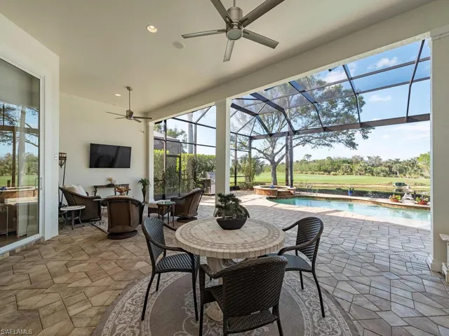 Lanai dining area and separate sitting area - plenty of room under cover