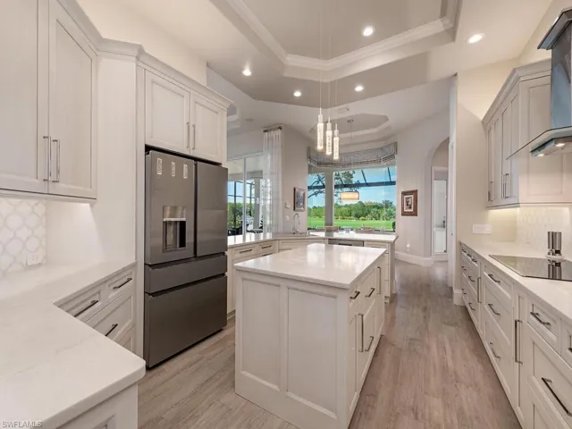 Kitchen with view of lanai and beyond