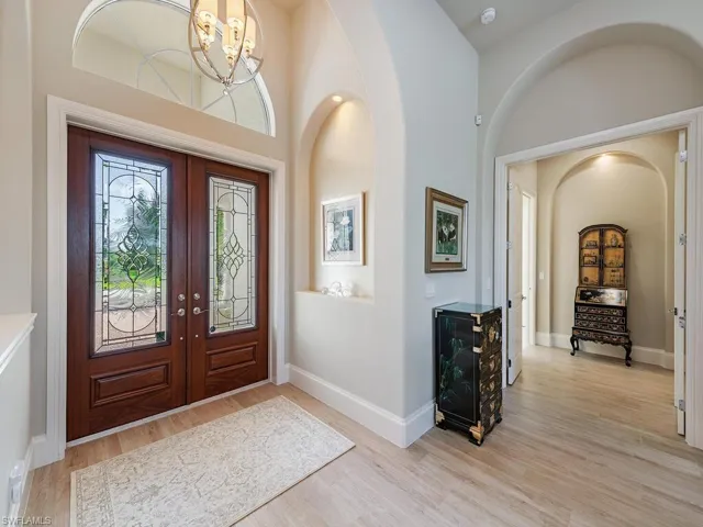Foyer with view of French door entrance to the Primary Suite