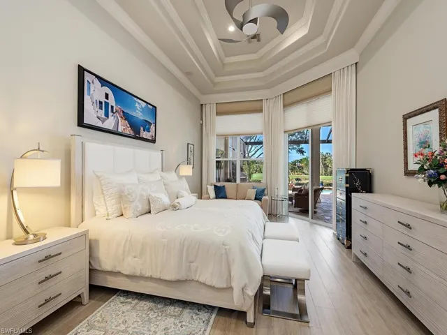 Primary bedroom with sitting area and views and access to the lanai