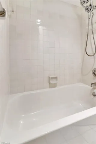 Tub and shower in upstairs bathroom