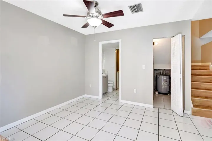 Full Guest bath with shower and extra storage under stairs