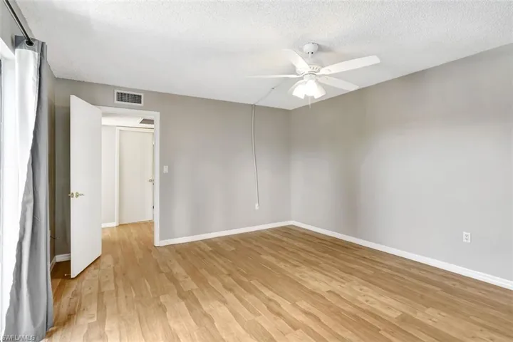 Large guest bedroom with ample closet space