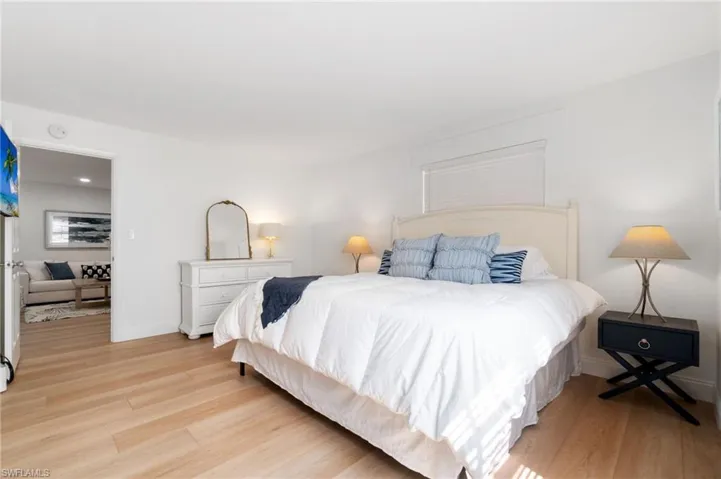 Bedroom with light wood finished floors
