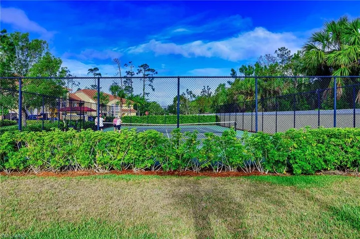 Surrounding community featuring a lawn
