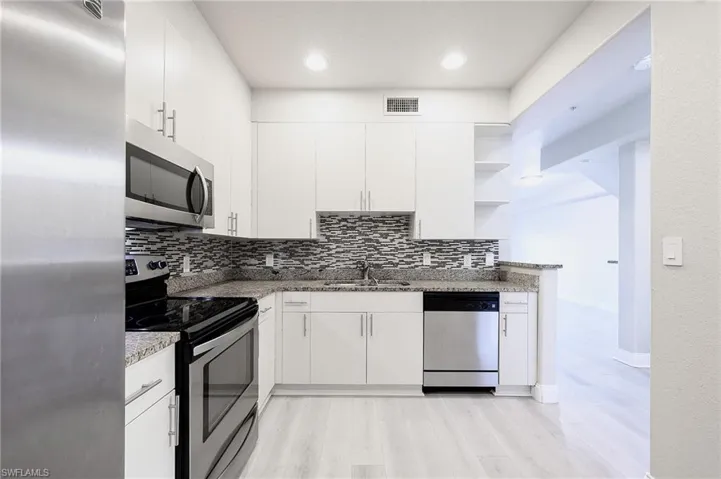 Kitchen featuring light hardwood / wood-style floors