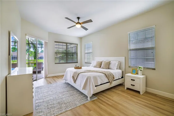 Bedroom featuring light wood-style floors and a ceiling fan