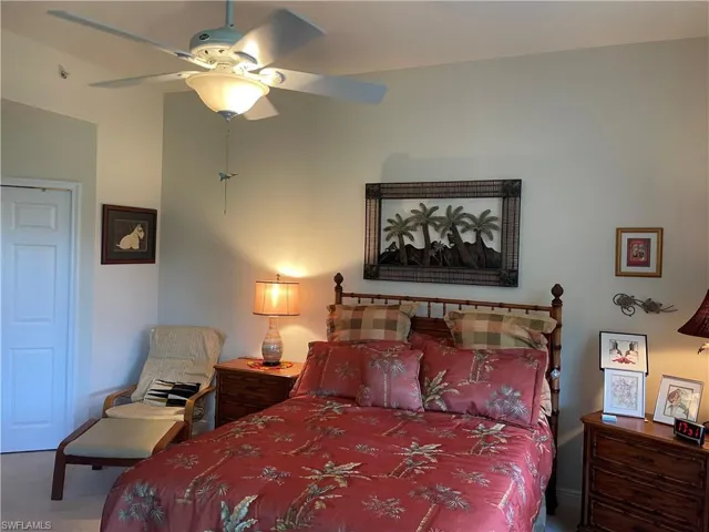 Bedroom with carpet flooring and ceiling fan