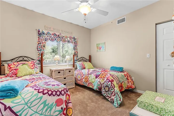 Bedroom with carpet floors and ceiling fan
