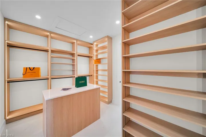 Walk in closet with attic access
