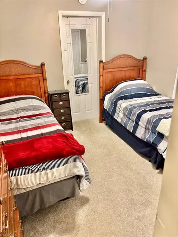 Bedroom with carpet flooring