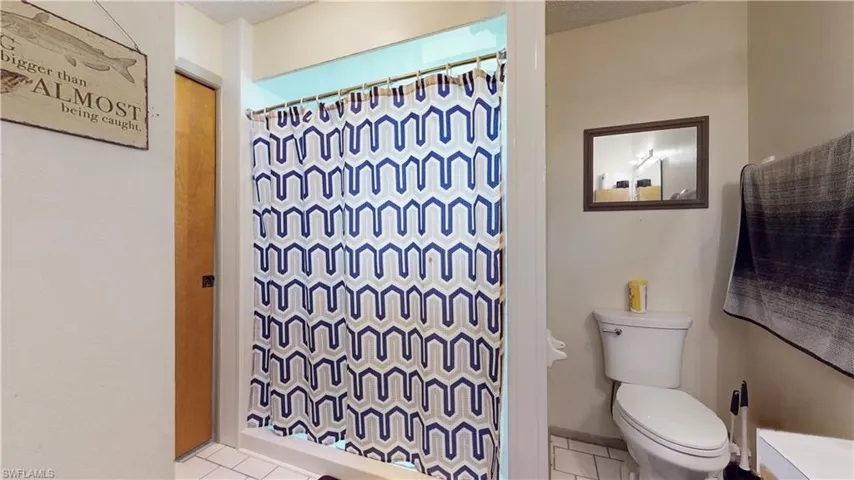 2nd bathroom with walk-in shower and handicap rails