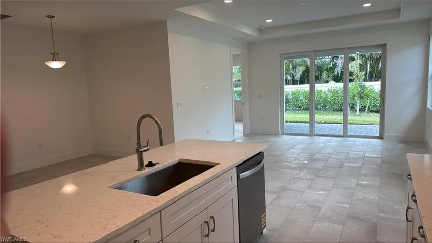 View of backyard space from kitchen