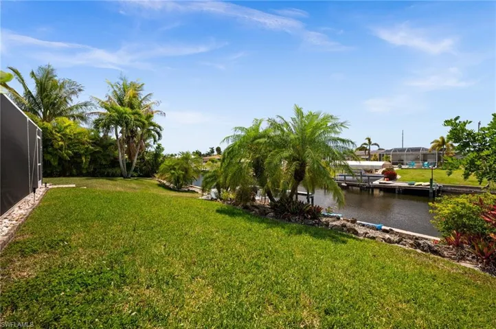 Back yard has lots of space and waterfront views