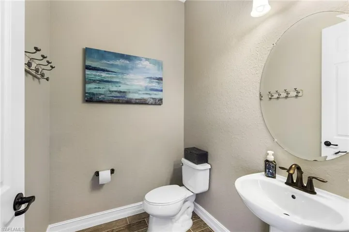 Half Bathroom just off lanai/pool.
