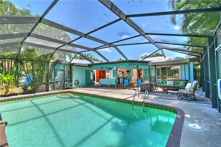 Fully screened pool yard and lanai with hot-tub and swing that stay!