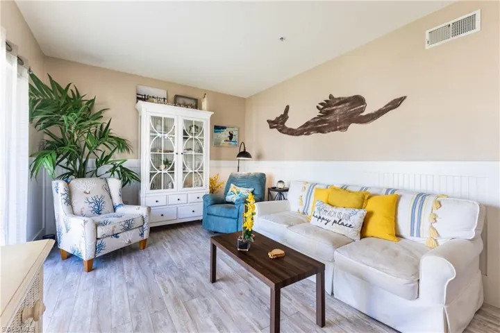 Living room with light wood-style floors