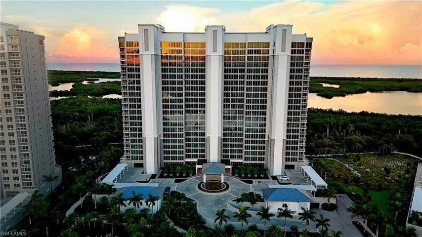 Property at dusk with a water view