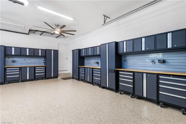 All Cabinetry is remaining with the home! 2 ceiling fans in garage.