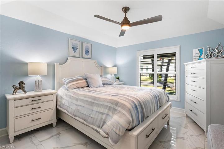 Second bedroom w/ensuite bath.  Lots of natural light pours into the comfy space!