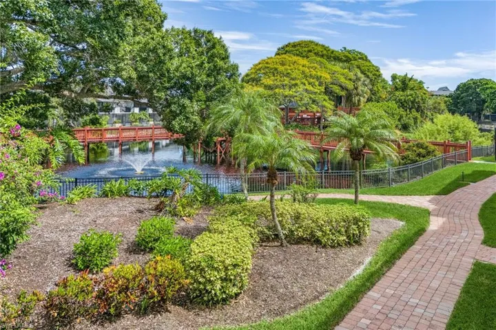 View of yard with a water view