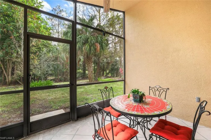 Screened in a large enough for a table and lounge chair