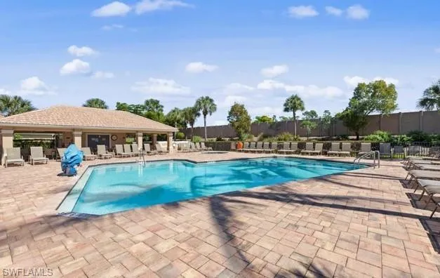 View of pool with a patio area