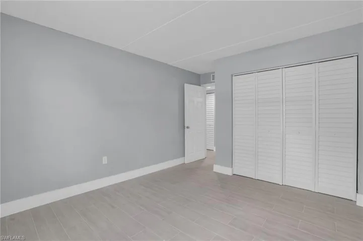 Unfurnished bedroom with a closet