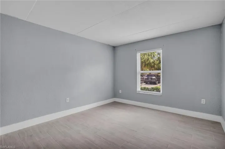 Unfurnished room featuring light hardwood / wood-style flooring