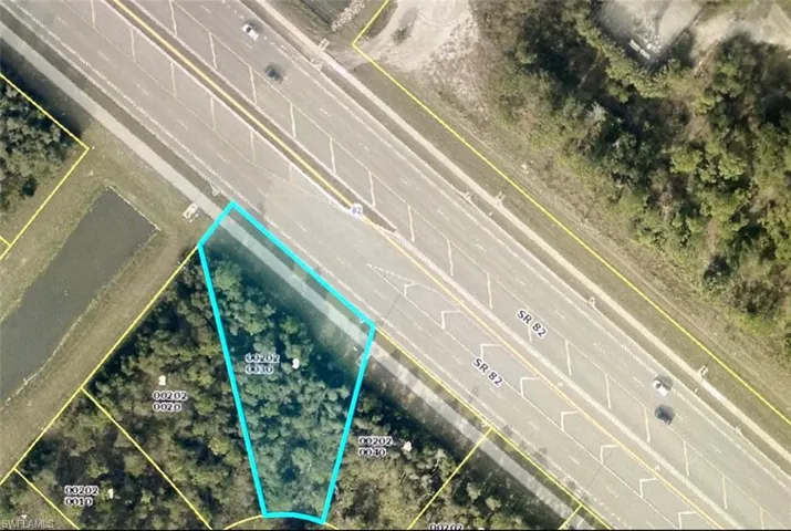 Aerial overview of property's location with property parcel outlined