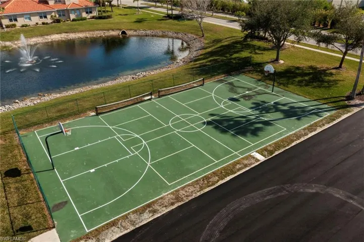 Community multi use sports court. Presently used as full basketball and temporary pickleball courts.