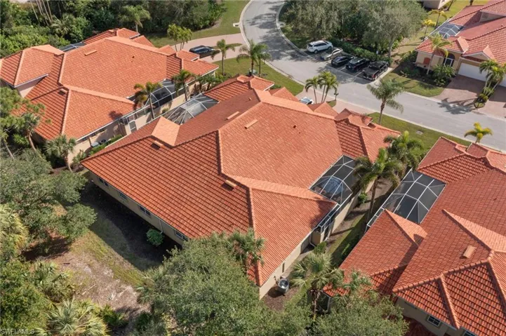 Birds eye view of property from the preserve, Notice new roofs 2023.