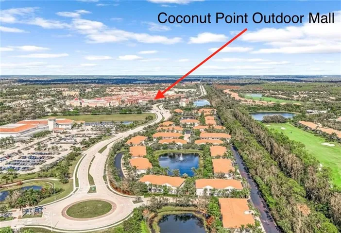 Bird's eye view featuring golf course view and a water view