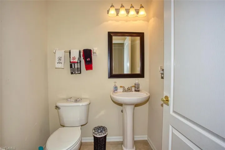 Half bathroom outside of the den