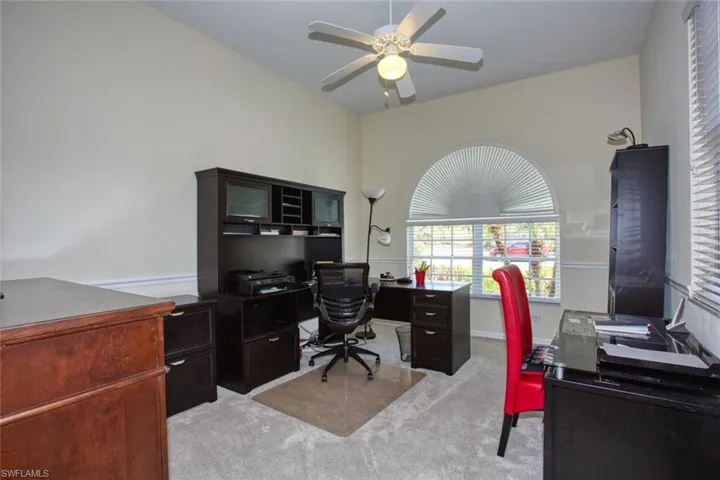 Office with light colored carpet