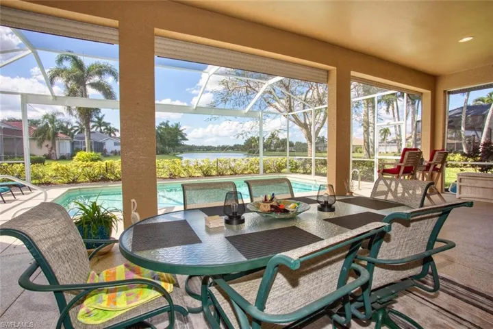 Lanai, covered area featuring a water view and a wealth of natural light