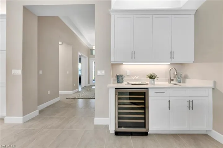 Wet Bar with wine/beverage cooler and sink
