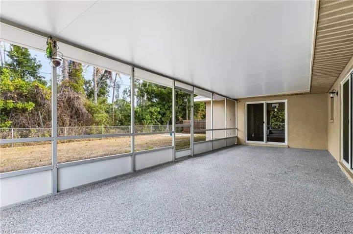 Spacious screened in lanai with new, fully epoxied floor.