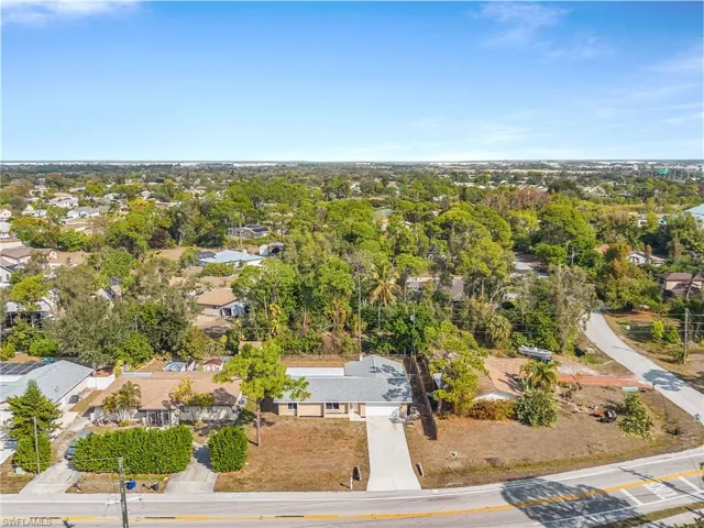 Property is located 1/4 mile west of Three Oakes Parkway.