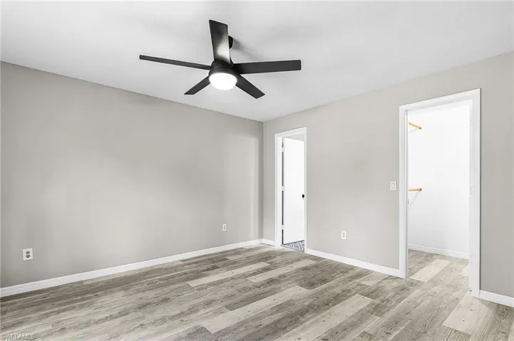 Shown, walk-in closet and entry to the master bathroom.