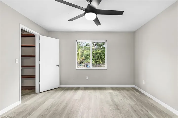 Master Bedroom, enter from Family Room with view of homes back yard.