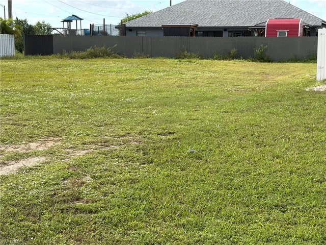 No trees to remove.  Nice flat lot!