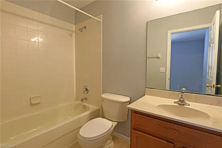 Full bathroom featuring vanity and shower / bathtub combination
