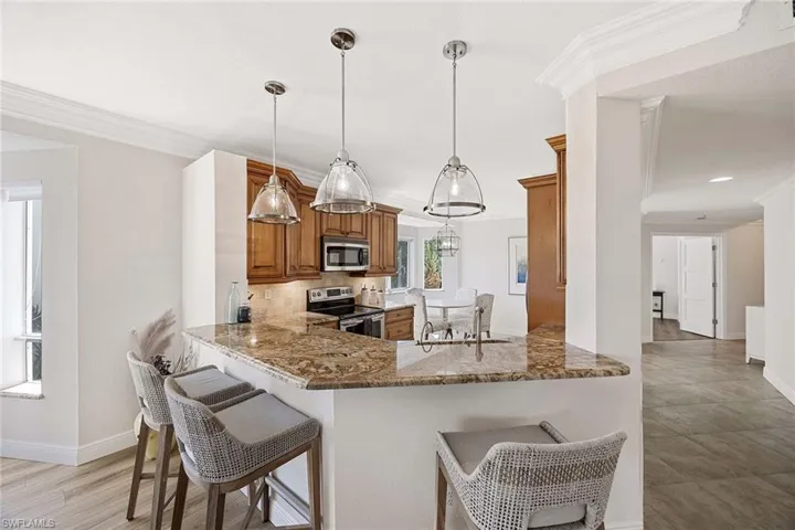7671  Pebble Creek  CIR, Naples, FL 34108