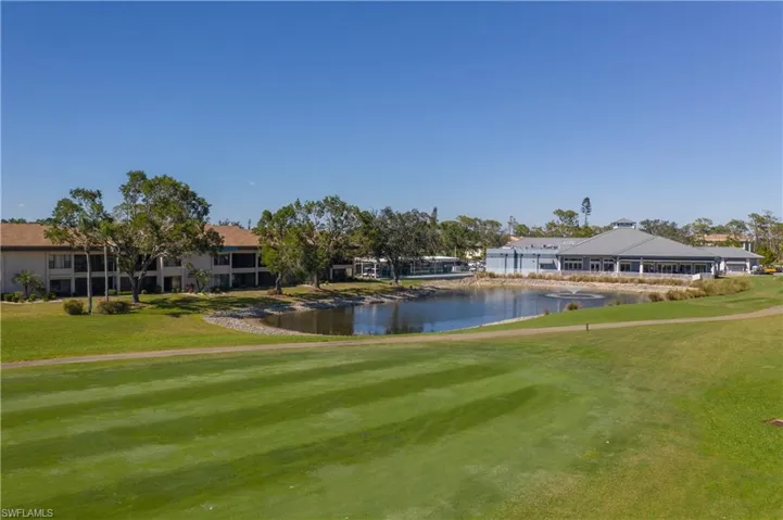 View of the clubhouse/lake/green behind the unit
