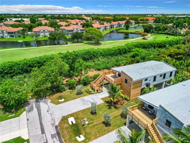 Bird's eye view with a residential view and a water view