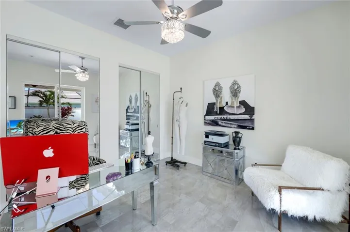 Bedroom with closet currently set up as an office