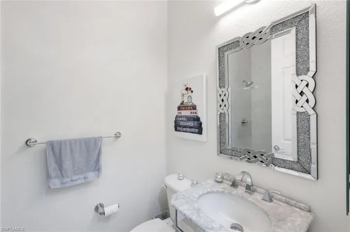 Bathroom with toilet and a sink